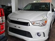 Off-White Mitsubishi RVR 2015 - Sleek and Spacious for Your Next Adventure! for sale