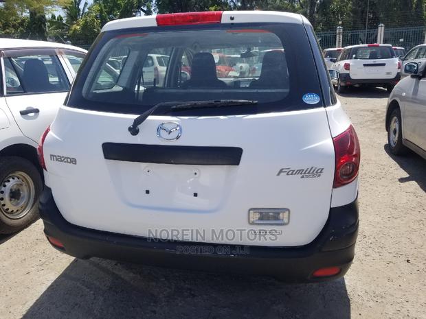 Pearl Edition Mazda Familia 2014: Reliable Used Car for Sale