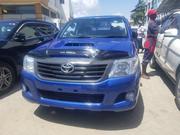 Blue 2014 Toyota Hilux: Dynamic Off-Road Performance for sale