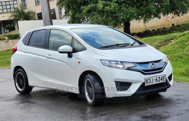 White 2015 Honda Fit - Compact Car with Exceptional Fuel Efficiency