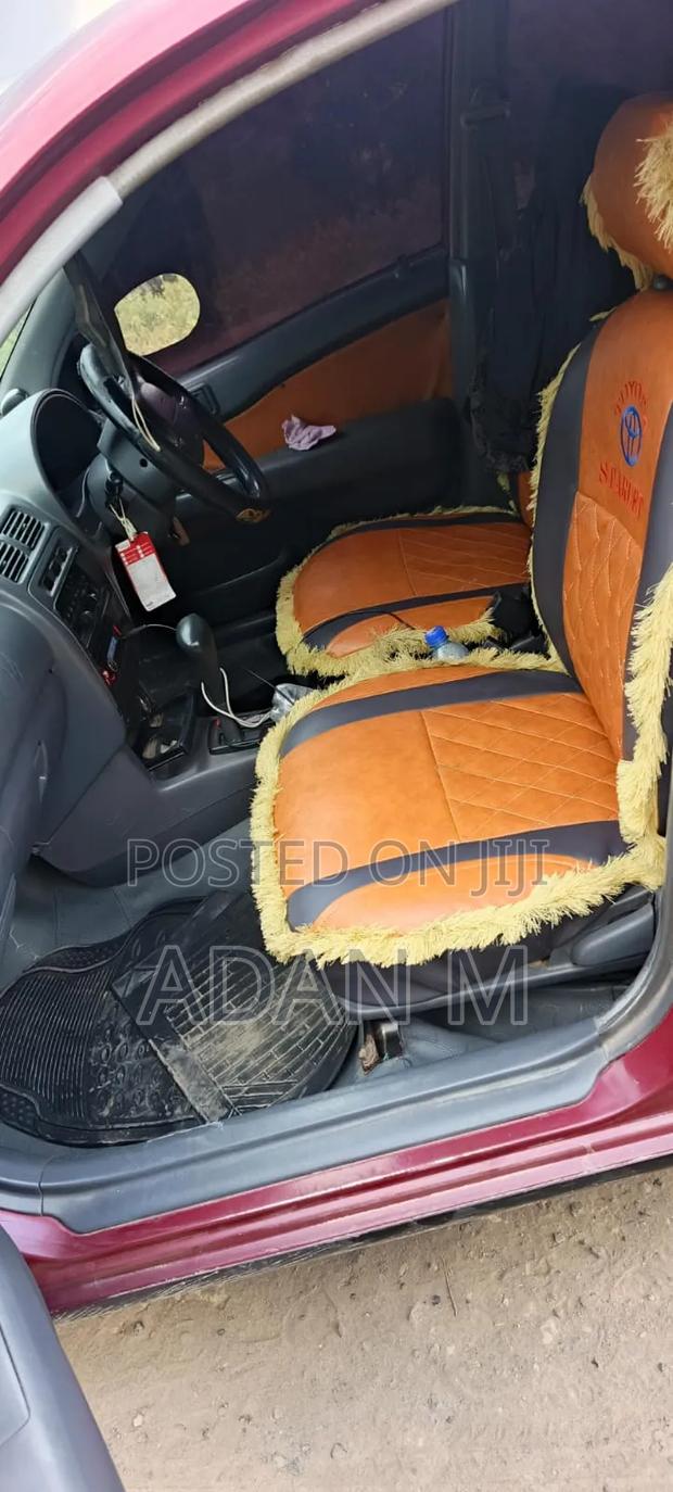 Toyota Starlet 1997 Maroon