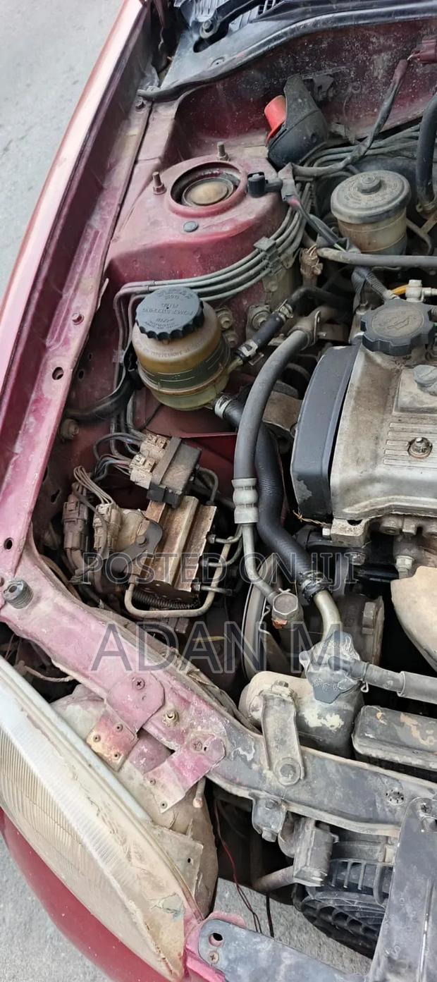 Toyota Starlet 1997 Maroon