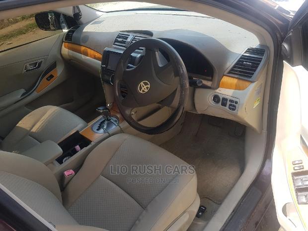2011 Toyota Premio in Red: A Luxury Sedan for Everyday Life