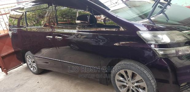 Purple Toyota Vellfire 2011 - High-End MPV, Pre-owned