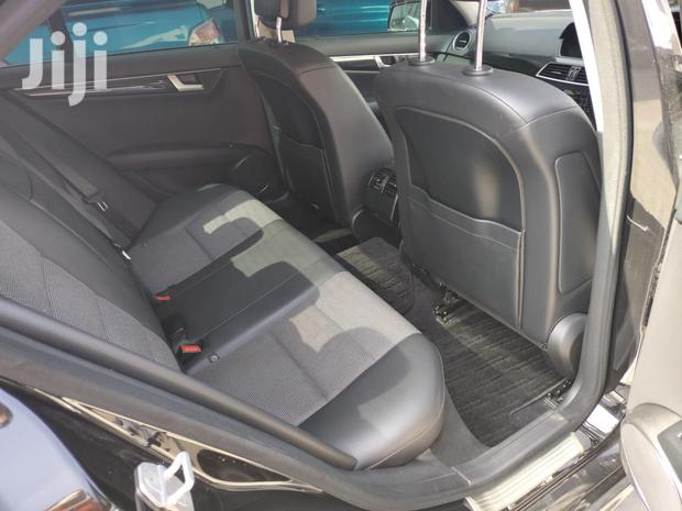 Pre-owned 2013 Mercedes-Benz C180 Black: Elegant Compact Car