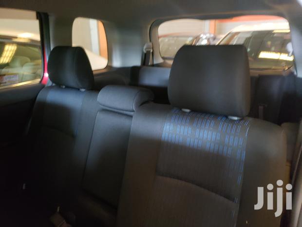 Red ISIS 2015 Toyota: High-Performance Compact Sedan
