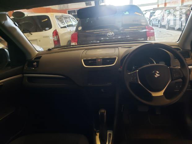 Black 2015 Suzuki Swift: Compact Sedan with Modern Amenities