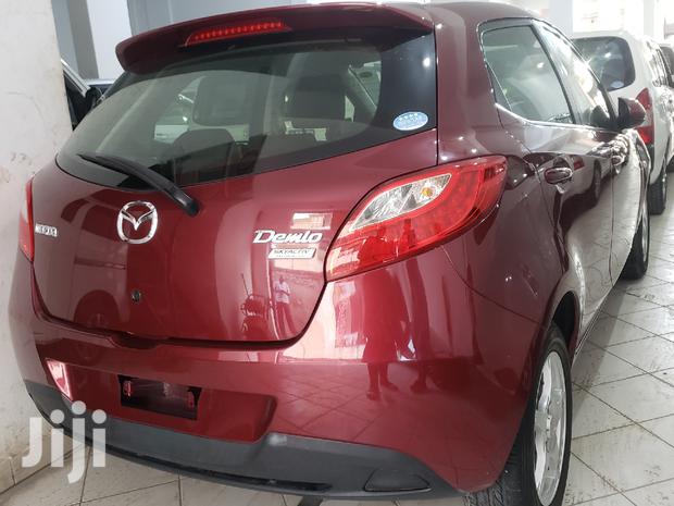 Red 2014 Mazda Demio: Compact Car, Big on Style and Performance!