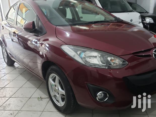 Red 2014 Mazda Demio: Compact Car, Big on Style and Performance!