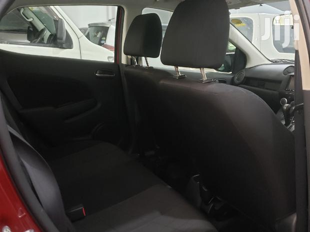 Red 2014 Mazda Demio: Compact Car, Big on Style and Performance!