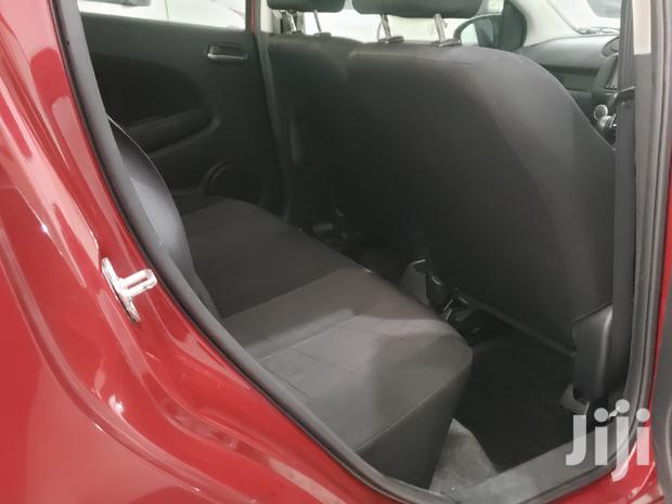 Red 2014 Mazda Demio: Compact Car, Big on Style and Performance!