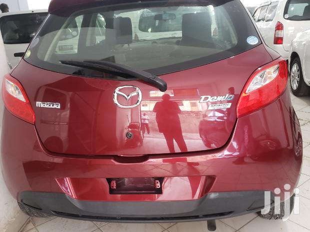 Red 2014 Mazda Demio: Compact Car, Big on Style and Performance!