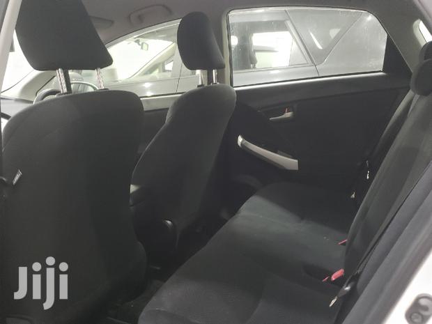 2015 Toyota Prius in White: Hybrid Sedan with Superior Fuel Economy