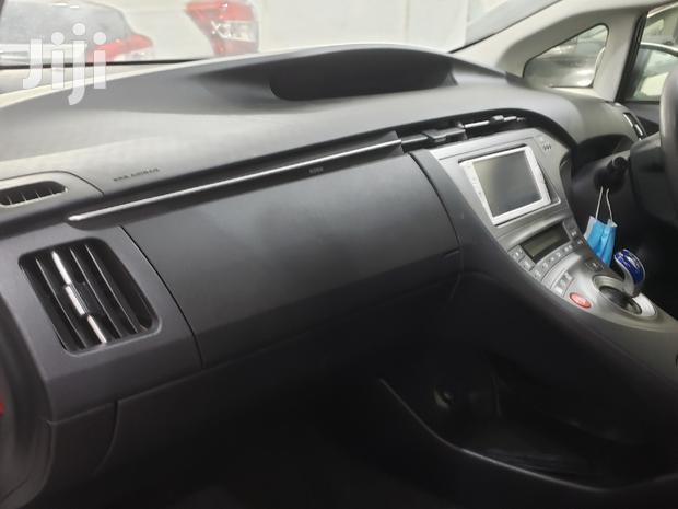 2015 Toyota Prius in White: Hybrid Sedan with Superior Fuel Economy
