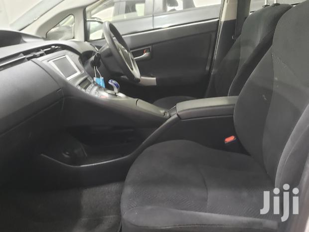 2015 Toyota Prius in White: Hybrid Sedan with Superior Fuel Economy