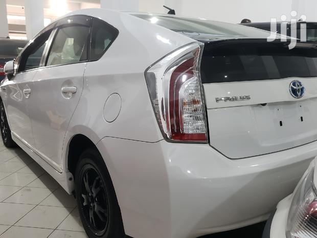 2015 Toyota Prius in White: Hybrid Sedan with Superior Fuel Economy