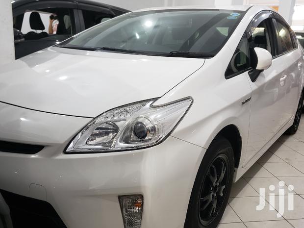 2015 Toyota Prius in White: Hybrid Sedan with Superior Fuel Economy