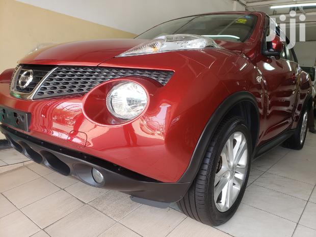 2014 Nissan Juke in Red: Elegant Compact SUV