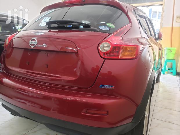 2014 Nissan Juke in Red: Elegant Compact SUV