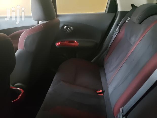 2014 Nissan Juke in Red: Elegant Compact SUV