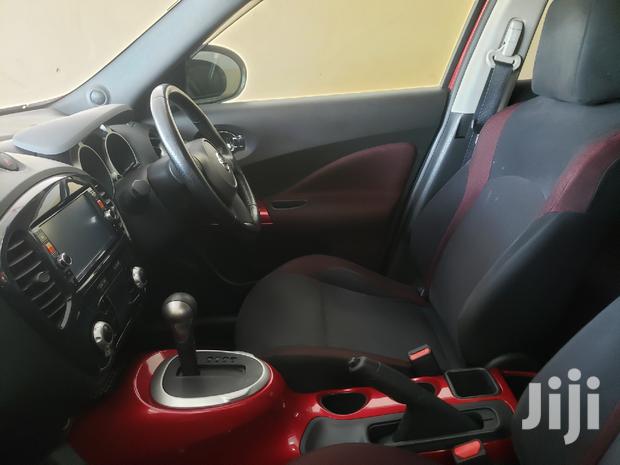 2014 Nissan Juke in Red: Elegant Compact SUV