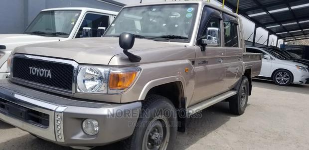 2014 Toyota Land Cruiser in Beige: Unmatched Style and Capability