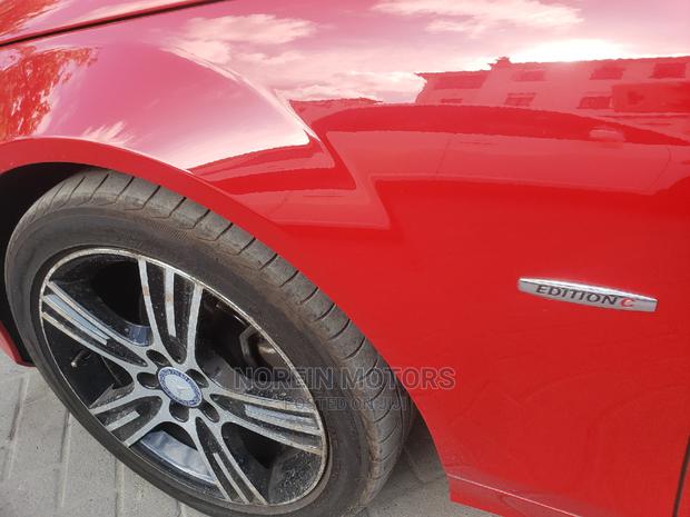 Red 2014 C180 Mercedes-Benz: Like-New Pre-Owned Luxury Car