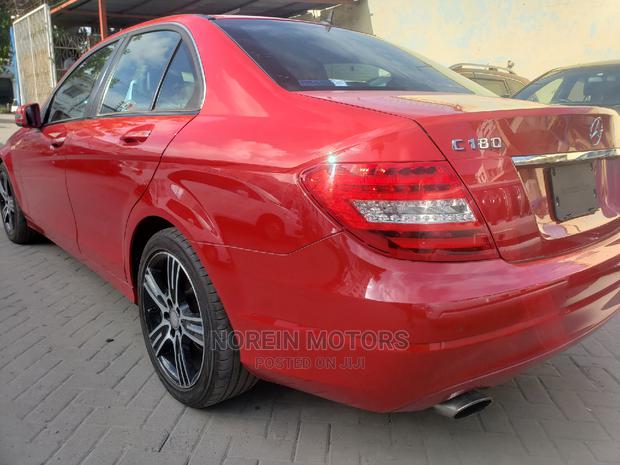 Red 2014 C180 Mercedes-Benz: Like-New Pre-Owned Luxury Car
