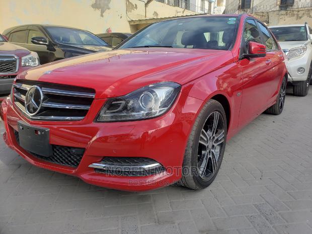 Red 2014 C180 Mercedes-Benz: Like-New Pre-Owned Luxury Car