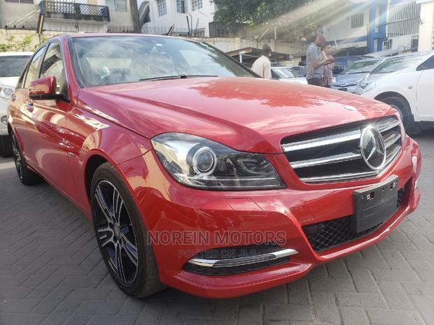 Red 2014 C180 Mercedes-Benz: Like-New Pre-Owned Luxury Car