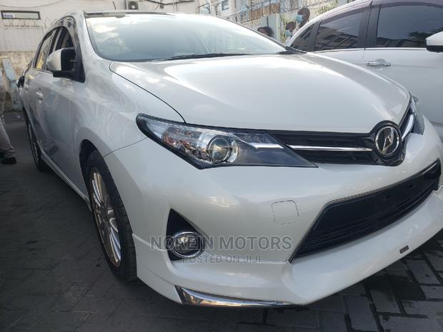 White 2015 Toyota Auris: Affordable Luxury & Comfort