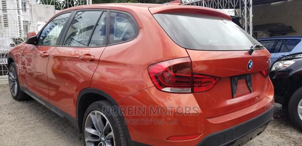 Pre-Owned 2015 BMW X1 in Orange - Ready for You