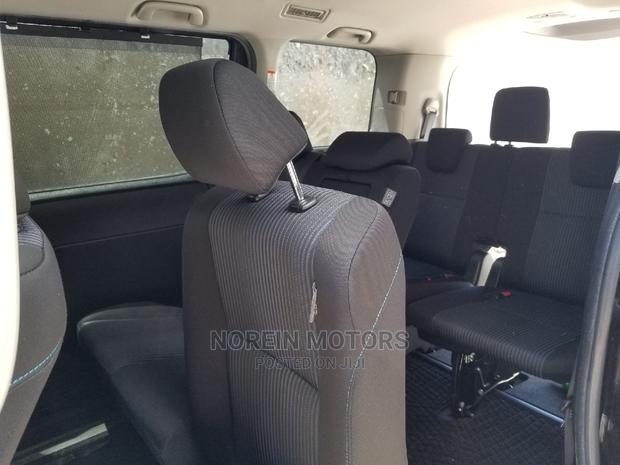 Purple Toyota Voxy 2015: Quality Pre-owned Car