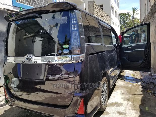 Purple Toyota Voxy 2015: Quality Pre-owned Car
