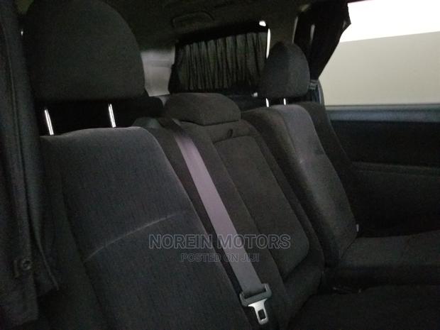 2015 Black Toyota Alphard: Sophisticated, Spacious, and Stylish