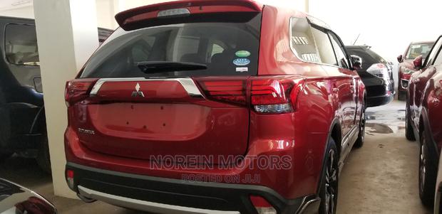 2015 Mitsubishi Outlander: Red Edition - Modern Off-Roader