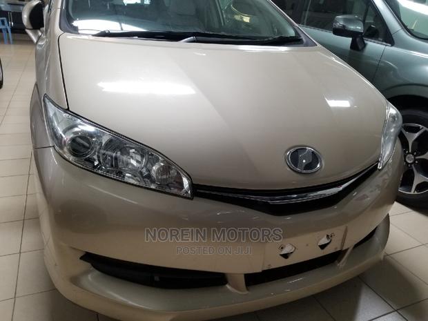 Green 2015 Toyota Wish: Efficient, Stylish, and Eco-friendly