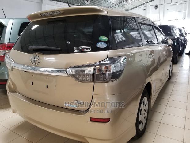 Green 2015 Toyota Wish: Efficient, Stylish, and Eco-friendly