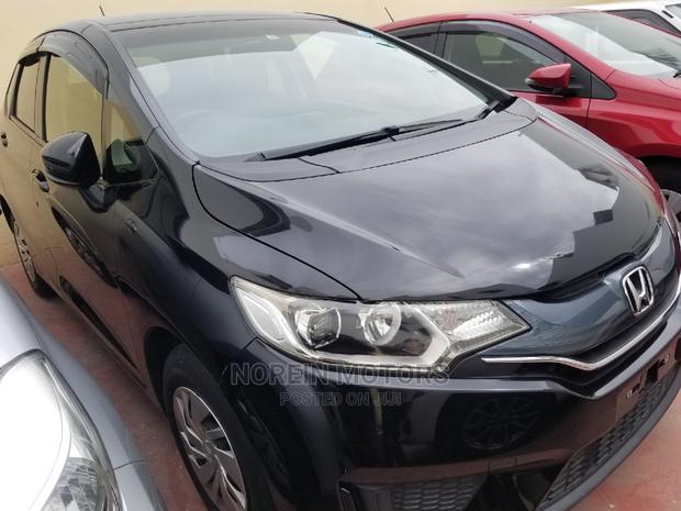 2015 Honda Fit Black: Quality Pre-Owned Car for a Great Price!