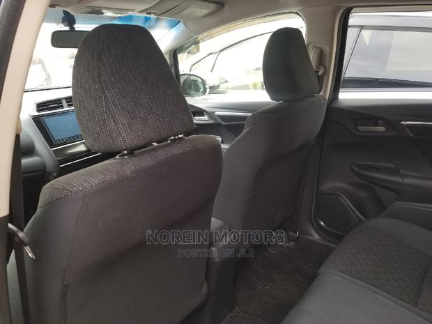 2015 Honda Fit Black: Quality Pre-Owned Car for a Great Price!