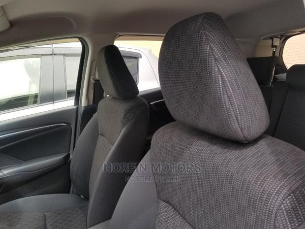 2015 Honda Fit Black: Quality Pre-Owned Car for a Great Price!
