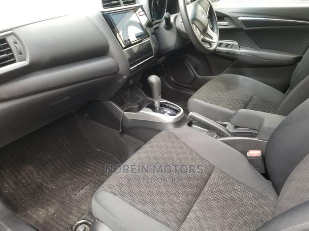 2015 Honda Fit Black: Quality Pre-Owned Car for a Great Price!