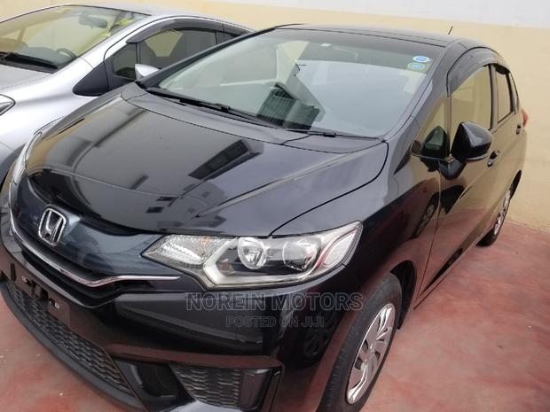 2015 Honda Fit Black: Quality Pre-Owned Car for a Great Price!