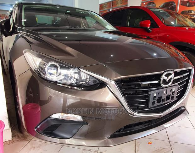 Drive the 2015 Mazda Axela Brown: Experience a New Level of Comfort