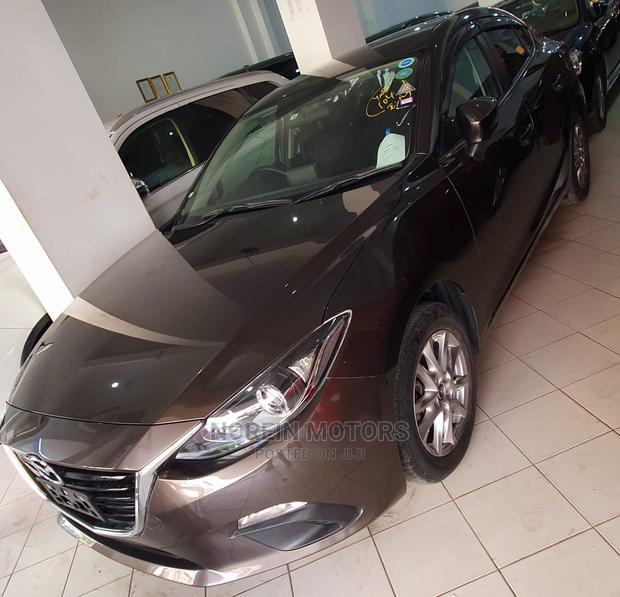 Drive the 2015 Mazda Axela Brown: Experience a New Level of Comfort