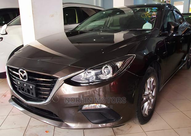 Drive the 2015 Mazda Axela Brown: Experience a New Level of Comfort