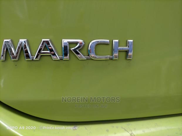 Eco-Friendly 2014 Nissan March Green: Compact Car for Modern Drivers
