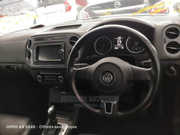 Pre-owned 2015 Volkswagen Tiguan Black - Stylish and Reliable SUV