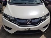 White Honda Fit 2015: Economical and Eco-friendly! for sale