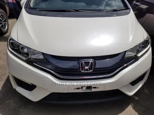 White Honda Fit 2015: Economical and Eco-friendly!